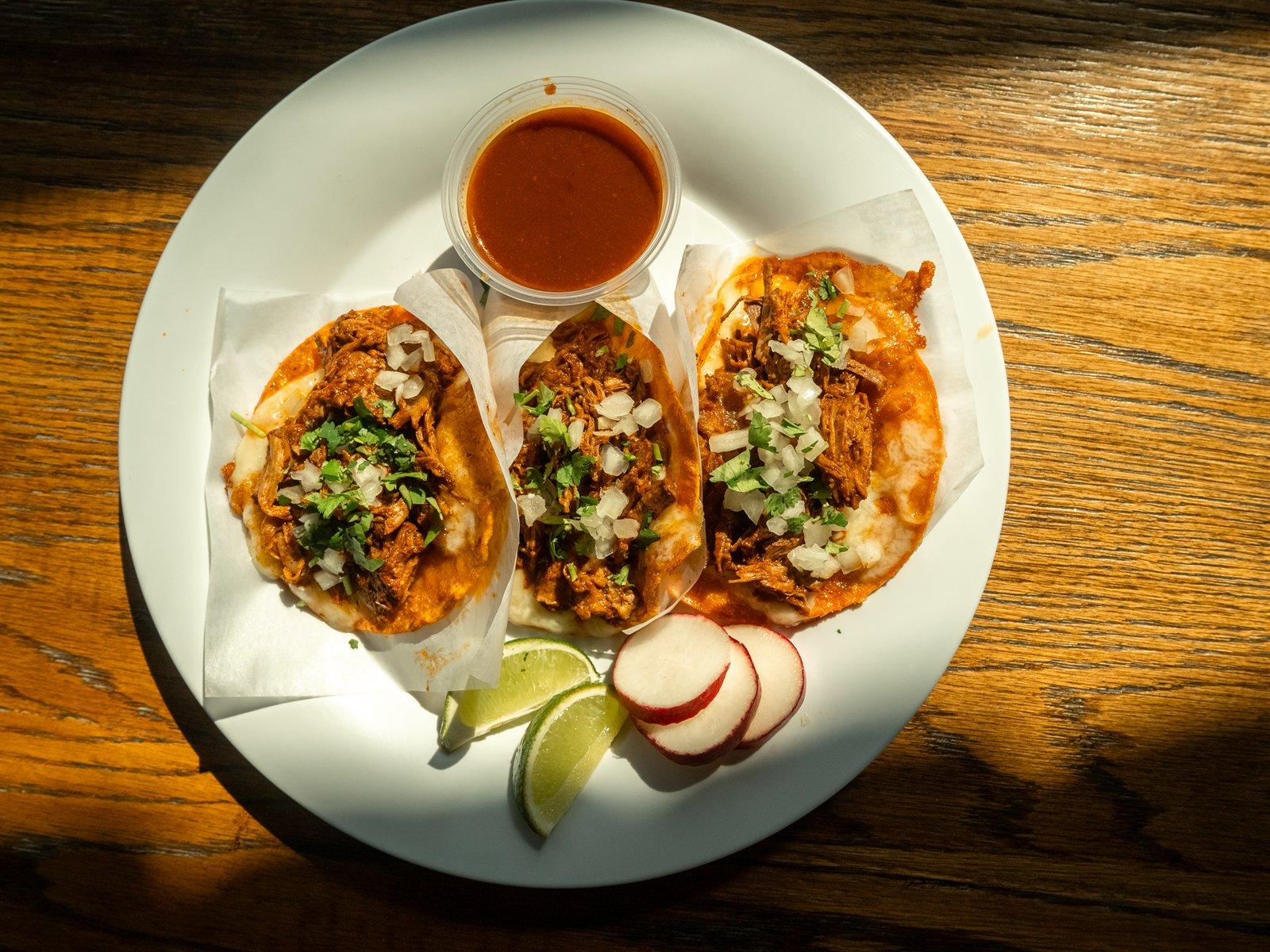Birria tacos with consomé